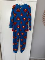 Superman onesie 122/128, Ophalen of Verzenden, Zo goed als nieuw, Jongen of Meisje