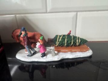 Paard met kerstboom en vader en kind beschikbaar voor biedingen