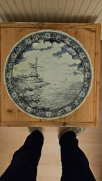 Delfsblauw bord  { 2 }, Ophalen