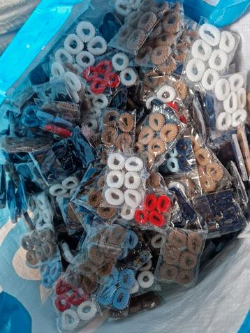 Grote partij haar elastiekjes beschikbaar voor biedingen