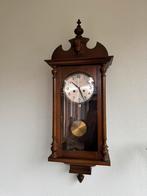 Olympic hangklok loopt goed, Ophalen