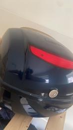 Vespa lx topkoffer, Ophalen