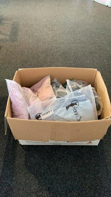 Partij nieuwe kleding dames en heren  beschikbaar voor biedingen