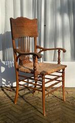 Elegante leunstoel met spijlen, Ophalen