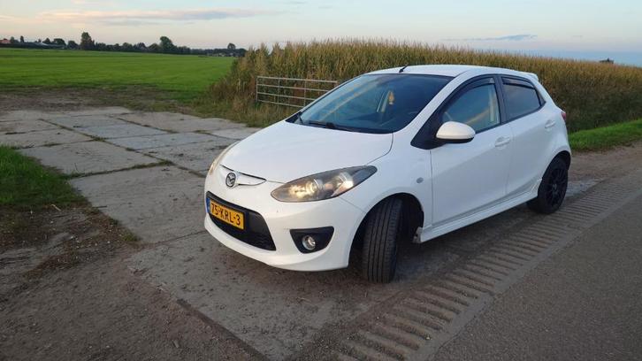 Mazda 2 1.5 76KW 5DRS 2010 Wit, Auto's, Mazda, Particulier, ABS, Airbags, Airconditioning, Boordcomputer, Centrale vergrendeling