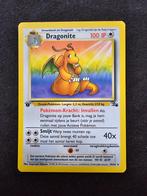 Dragonite 19/62 Fossil 1st Edition Nederlands NM, Hobby en Vrije tijd, Verzamelkaartspellen | Pokémon, Ophalen of Verzenden, Zo goed als nieuw