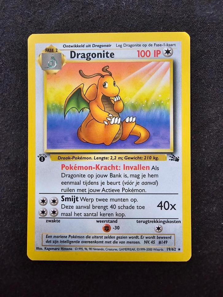 Dragonite 19/62 Fossil 1st Edition Nederlands NM, Hobby en Vrije tijd, Verzamelkaartspellen | Pokémon, Zo goed als nieuw, Losse kaart