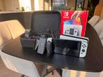 Nintendo Switch OLED – Zo goed als nieuw – Met travel case!, Spelcomputers en Games, Spelcomputers | Nintendo Switch, Ophalen of Verzenden