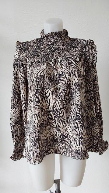 Unika top maat S-M beschikbaar voor biedingen