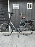 Mooie elektrische Sparta dames fiets., Fietsen en Brommers, Elektrische fietsen, Ophalen, Sparta, Zo goed als nieuw, 50 km per accu of meer