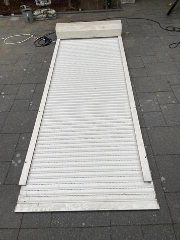 wit electrisch heroal  deur rolluik breed 1.06 x 2.67,5 hoog beschikbaar voor biedingen