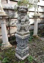 Chinees beeld van een Foo Dog, Tempelleeuw op zuil, Ophalen