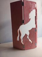 Paard in hout, Ophalen