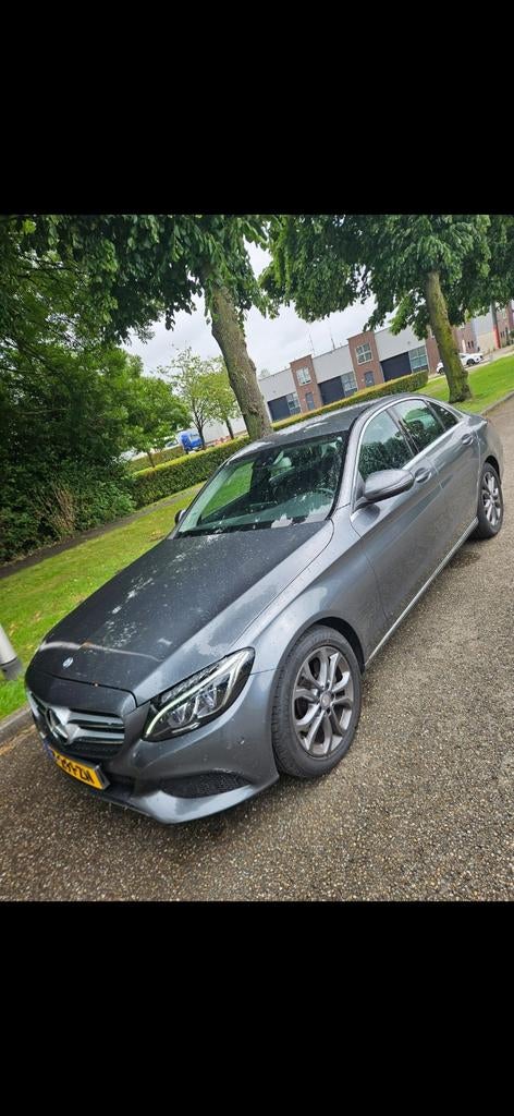 Mercedes-Benz C-Klasse C200 184pk 9G-TRONIC 2017 Grijs, Auto's, Mercedes-Benz, 1800 kg, 4 cilinders, 75 €/maand, Particulier