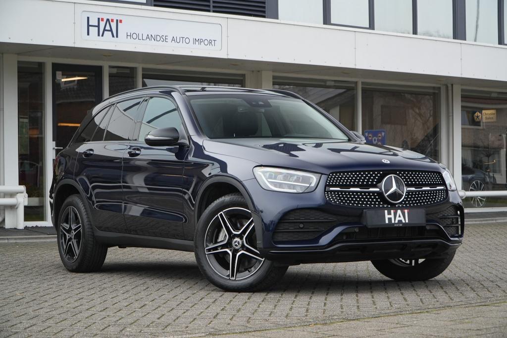 Mercedes-Benz GLC 300e 4MATIC AMG I Pano I Trekhaak I, Auto's, Automaat, Gebruikt, Zwart, Hybride Elektrisch/Benzine