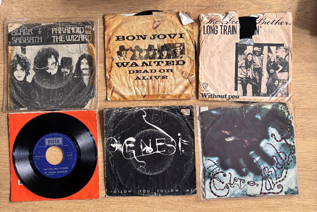 12 rock singles deep purple, led z, kiss, the cure (lezen), Ophalen of Verzenden, Gebruikt, Overige formaten, Overige genres