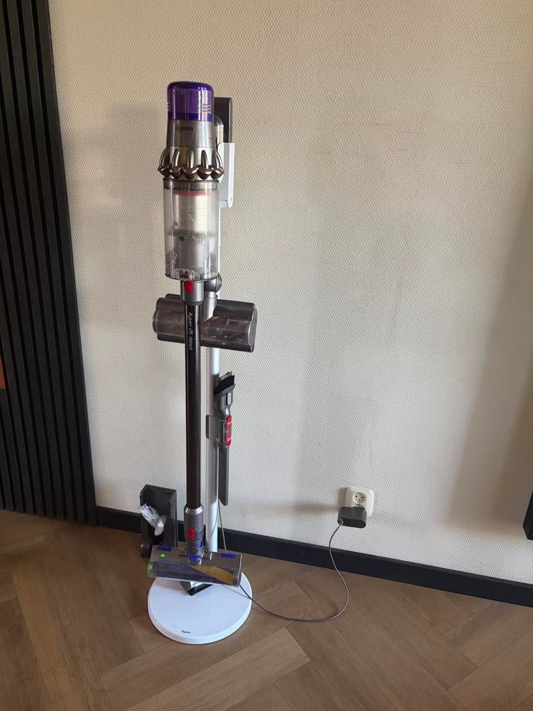 Dyson V15 Detect met toebehoren en oplaadpaal, Ophalen of Verzenden, Zo goed als nieuw, Reservoir, Stofzuiger