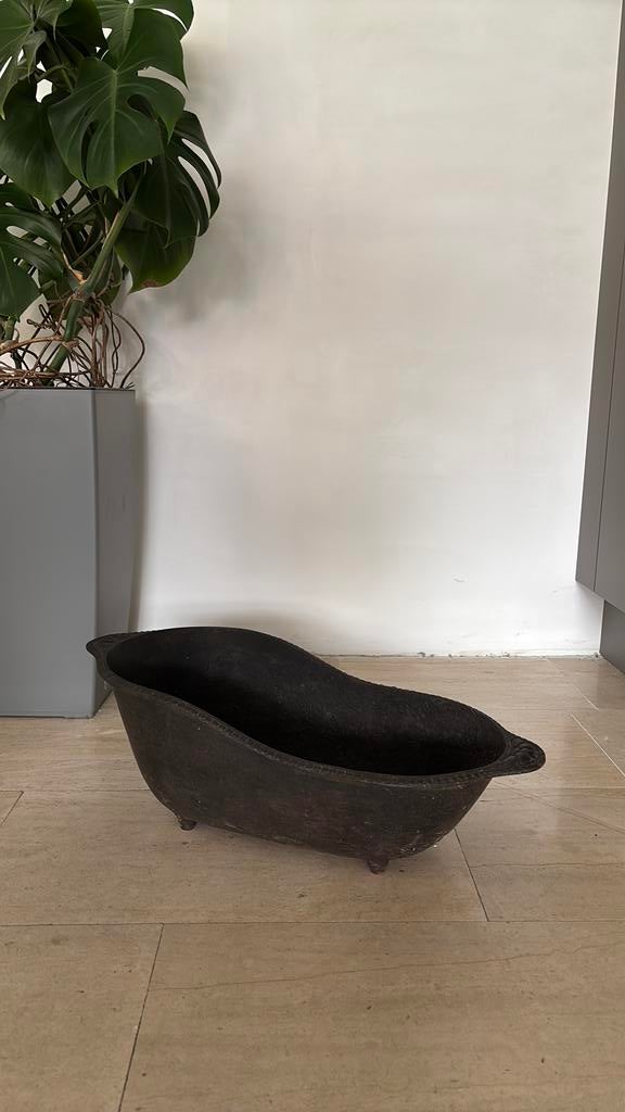 Oude gietijzeren kolenkit, Ophalen