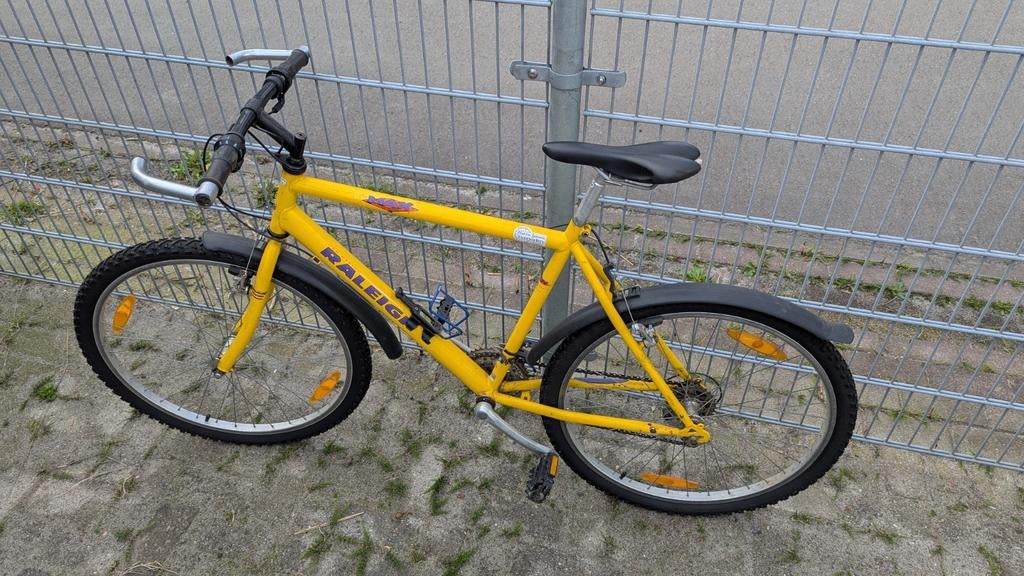 Raleigh gele mountainbike, Fietsen en Brommers, Fietsen | Mountainbikes en ATB, Overige merken, Gebruikt, Heren, Ophalen of Verzenden