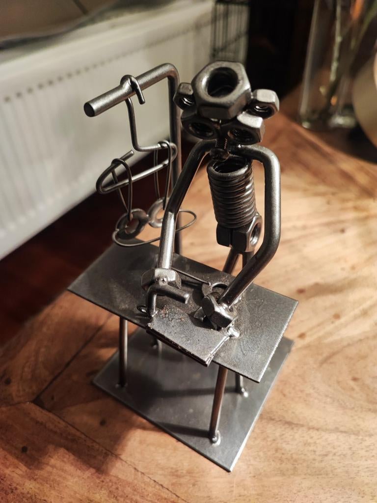 Stalen mannetje aan het strijken, Ophalen of Verzenden