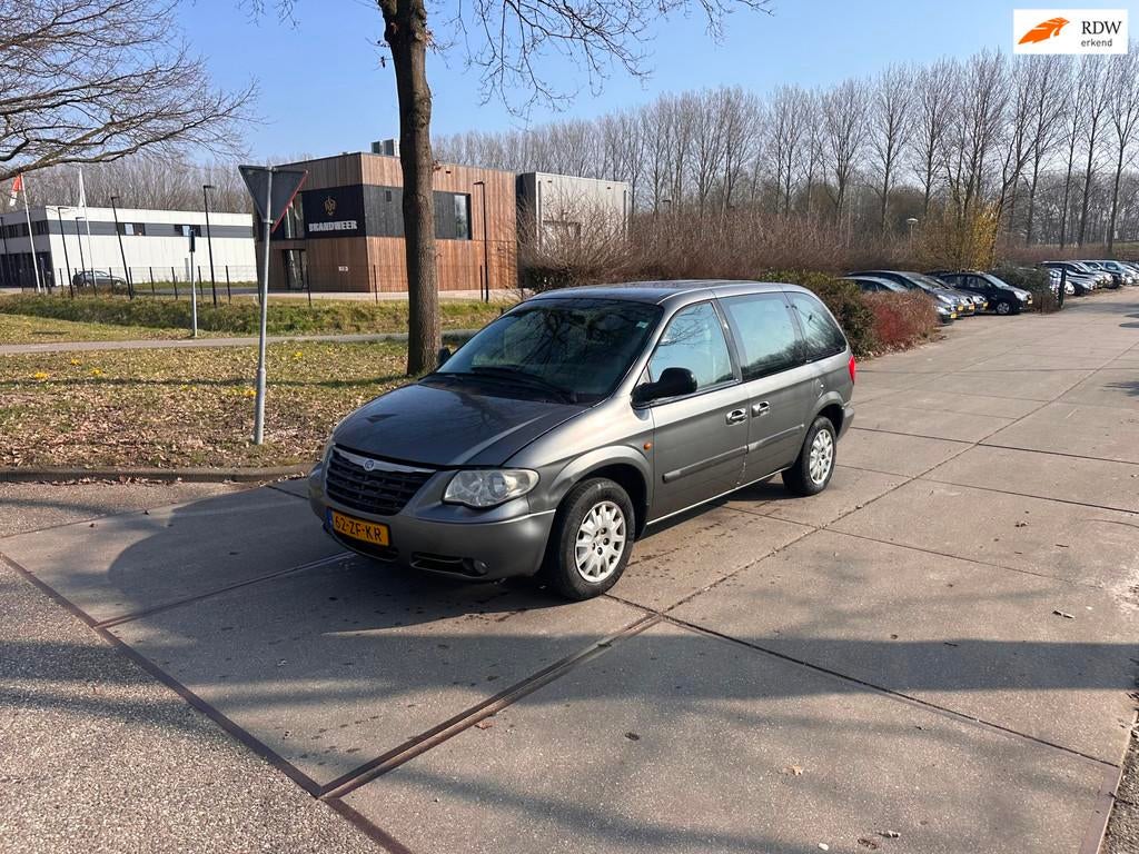 Chrysler Voyager 2.4i SE 7P.Navi.DVD, Auto's, Chrysler, Voorwielaandrijving, Elektrische ramen, 450 kg, Gebruikt