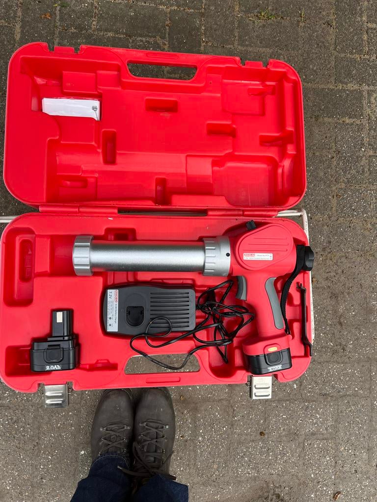 NIKO kitpistool op accu met lader en 2 accu's, Ophalen of Verzenden, Zo goed als nieuw