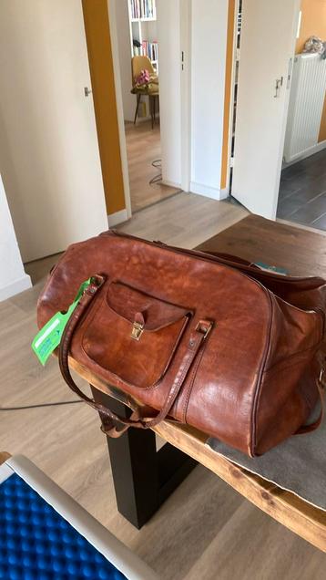 Vintage real leather weekend bag beschikbaar voor biedingen