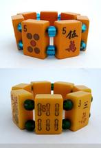 2 Amberkleurige Bakeliet - Catalin Mahjong Stenen Armbanden, Verzenden, Overige materialen, Armband
