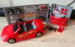 Playmobil raceauto in garage, Ophalen of Verzenden, Gebruikt