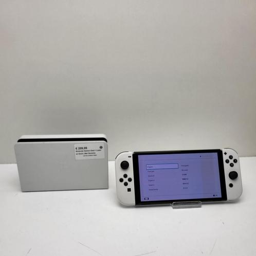Nintendo Switch Oled + Lader en Dock | Met Garantie, Spelcomputers en Games, Spelcomputers | Nintendo Switch, Gebruikt