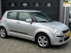 Suzuki Swift 1.3 Exclusive - 5 Deurs - Airco / New Apk - Nw, Voorwielaandrijving, Stof, Gebruikt, Zwart
