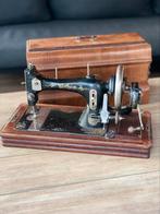 Antieke Wertheim hand naaimachine, Ophalen
