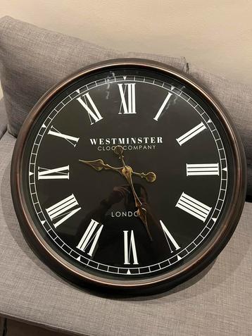 Wandklok 70cm diameter beschikbaar voor biedingen