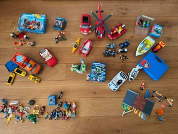 Grote set Playmobil politie, brandweer, boten en poppetjes beschikbaar voor biedingen