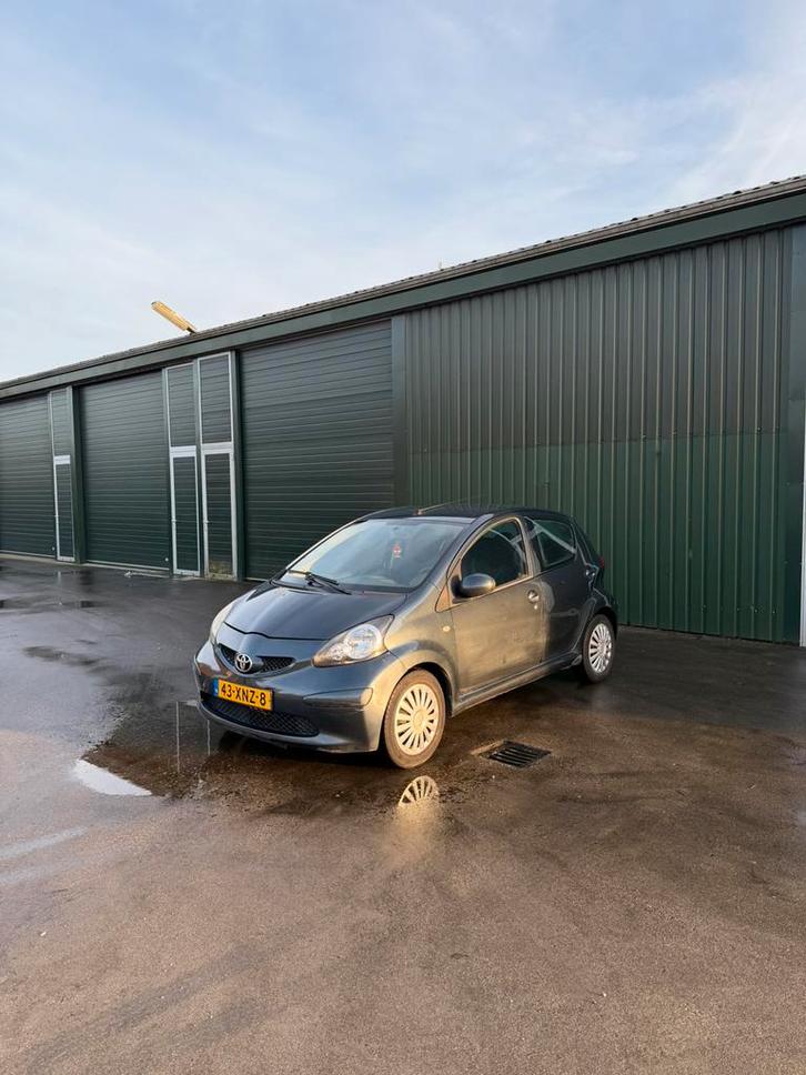 Toyota Aygo 1.0 12V Vvt-i 5DRS 2006 Grijs, Auto's, Toyota, Bedrijf, Aygo, Benzine, A, Hatchback, Handgeschakeld, Geïmporteerd