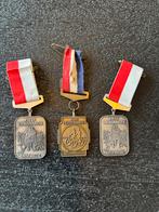 Drie Fietsvierdaagse medaille Enschede fiets vierdaagse, Ophalen of Verzenden, Overige materialen