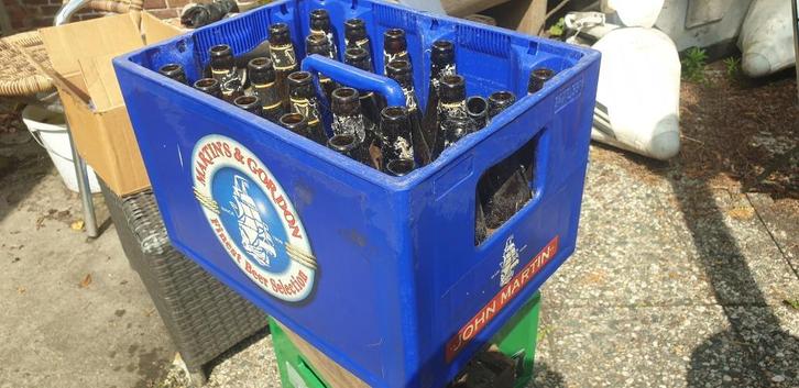 Bierkrat martin's&gordon/ john martin guiness lege flessen, Verzamelen, Biermerken, Gebruikt, Flesje(s), Overige merken, Ophalen of Verzenden