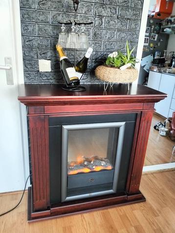 Sfeer openhaard Ruby met verlichting en verwarming beschikbaar voor biedingen