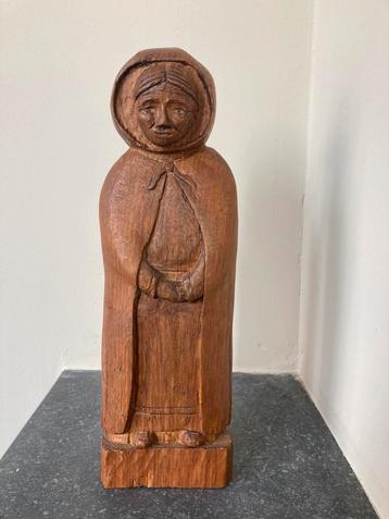 Houten heiligenbeeldje beschikbaar voor biedingen