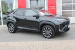 Toyota Yaris Cross 1.5 Hybrid Dynamic Plus (bj 2024), Stof, Gebruikt, Adaptive Cruise Control, Met garantie (alle)
