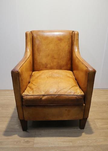 Lederen clubfauteuil, armstoel beschikbaar voor biedingen