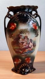 Set van twee Rococo vazen met cherubijntje, Antiek en Kunst, Ophalen of Verzenden