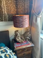 Zwaren unieke lamp kip, Ophalen