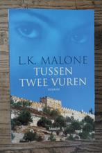 Tussen twee vuren - L.K. Malone (christelijke roman), Ophalen of Verzenden, Zo goed als nieuw
