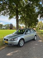 Volvo V50 2.4 D5 Geartronic 2006 Grijs, Auto's, Zwart, 1436 kg, 179 pk, Leder en Stof