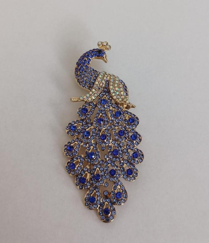 Pauw broche, Sieraden, Tassen en Uiterlijk, Broches, Nieuw, Overige materialen, Overige kleuren, 7 tot 10 cm, Met strass, Ophalen of Verzenden