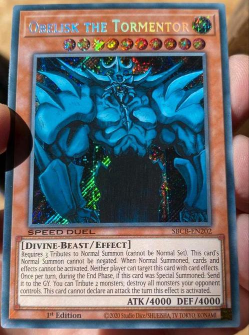 Yu-Go-Oh! Obelisk the Tormentor SBCB 1st Edition !, Hobby en Vrije tijd, Verzamelkaartspellen | Yu-gi-Oh!, Zo goed als nieuw, Losse kaart