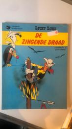 Lucky luke - eerste druk - de zingende draad, Boeken, Stripboeken, Ophalen of Verzenden, Zo goed als nieuw