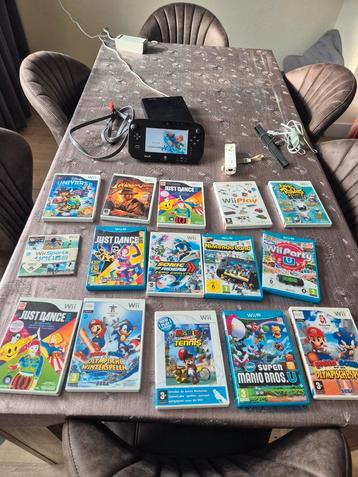 Mega grote  wii u set met 16 games veel  mario games  beschikbaar voor biedingen