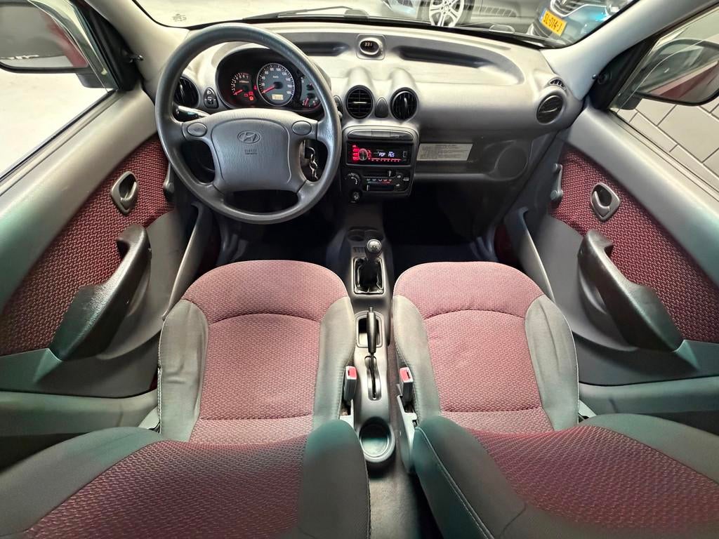 Hyundai Atos 1.1i Active Young|Stuurbekrachtiging|5 deurs|zu, Voorwielaandrijving, 4 cilinders, Met garantie (alle), Leder en Stof